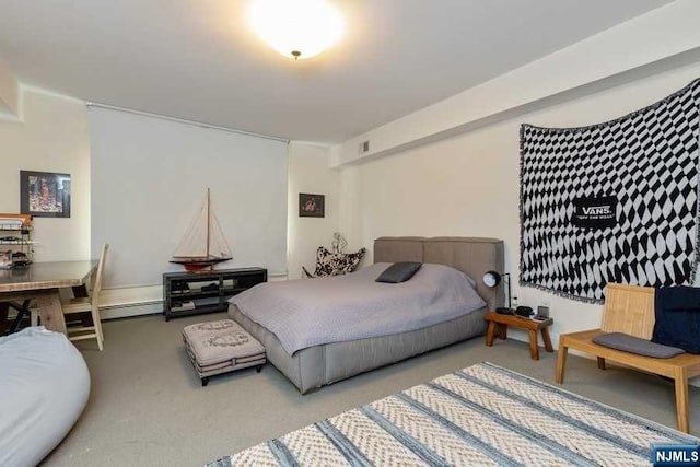 bedroom featuring carpet floors and a baseboard radiator