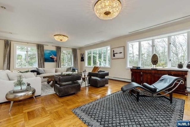 living area featuring baseboard heating, light parquet flooring, and ornamental molding