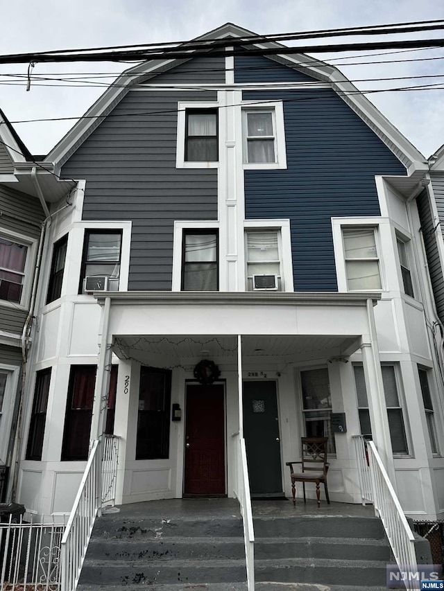 view of property with covered porch