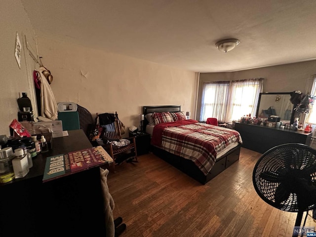 bedroom featuring hardwood / wood-style floors