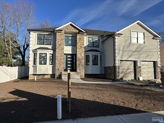 view of front of home with a garage