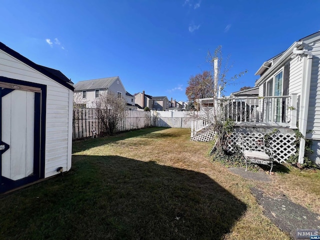 view of yard with a deck