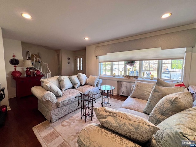 living room featuring radiator and hardwood / wood-style flooring