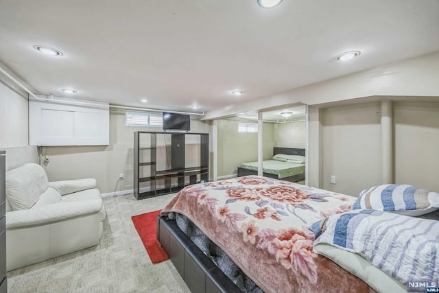 bedroom with light colored carpet