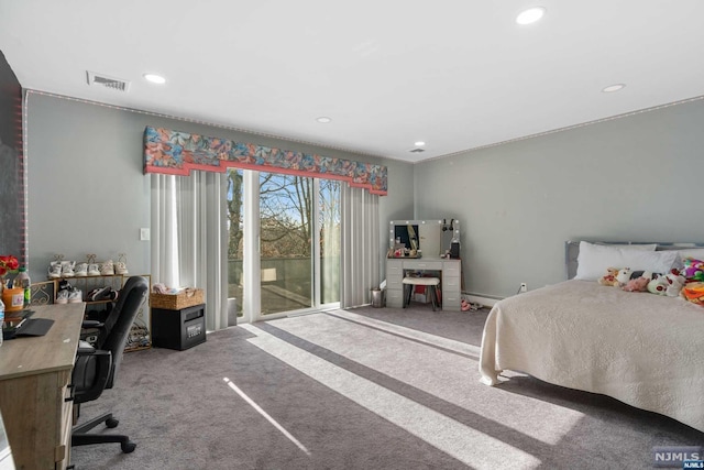 bedroom with access to outside, carpet flooring, and a baseboard heating unit