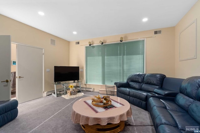 carpeted living room with a baseboard heating unit