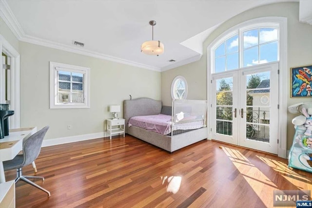 bedroom with access to exterior, french doors, ornamental molding, and hardwood / wood-style flooring