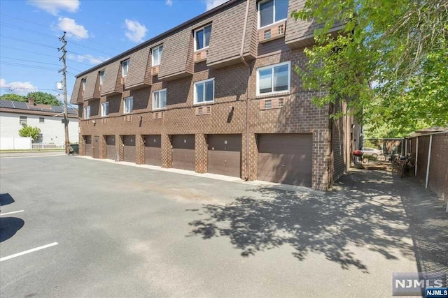 view of building exterior with a garage