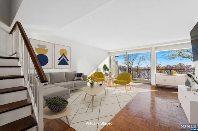 living room with parquet floors