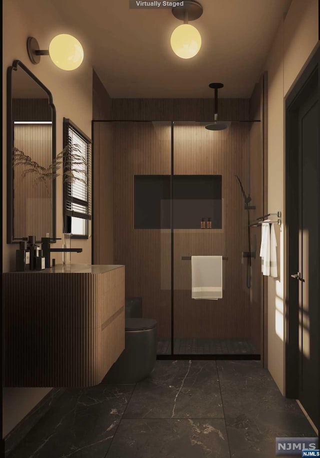 bathroom featuring toilet, an enclosed shower, and vanity