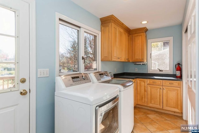 washroom with washer and dryer, cabinet space, recessed lighting, and light tile patterned floors