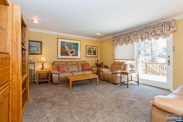 carpeted living area featuring crown molding