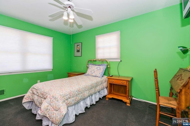 bedroom with baseboards, a ceiling fan, and carpet flooring