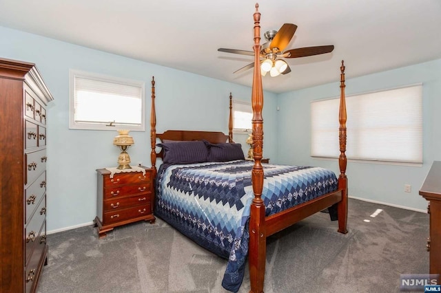 bedroom featuring baseboards, carpet floors, and ceiling fan