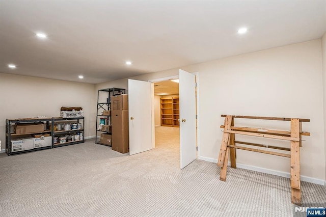 basement with carpet flooring, recessed lighting, and baseboards