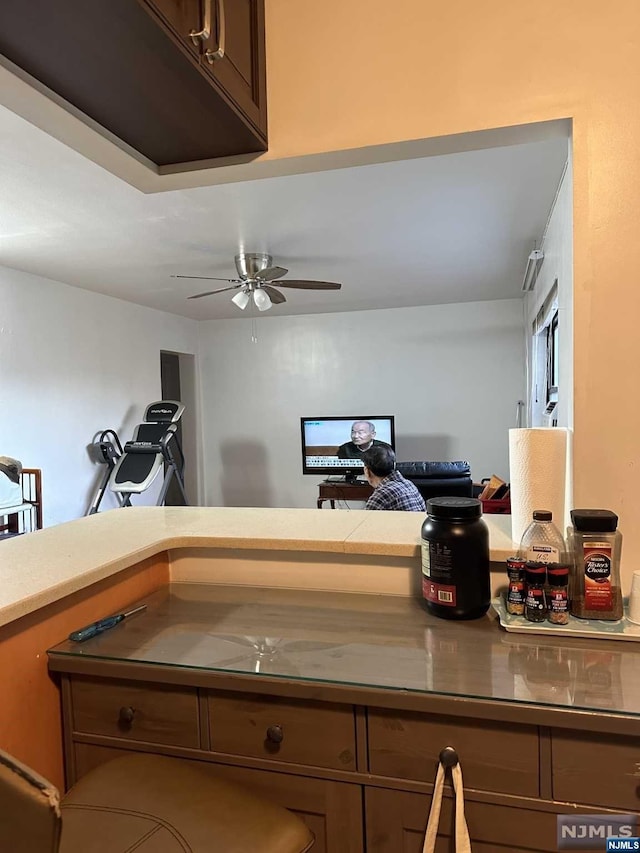 kitchen featuring ceiling fan