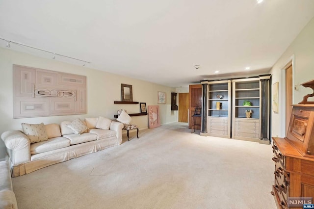 living room featuring light carpet