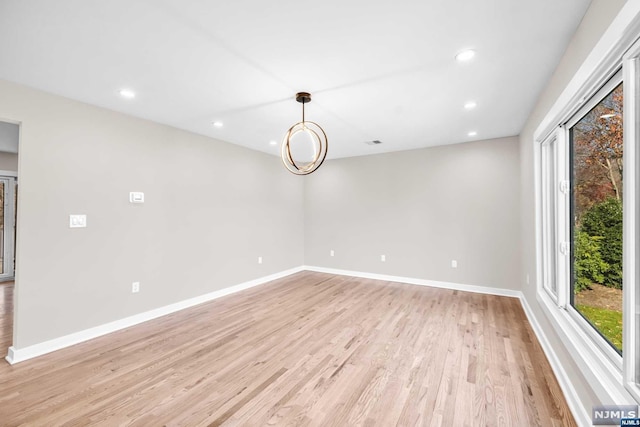 empty room featuring light hardwood / wood-style flooring