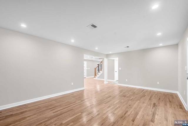 empty room with light wood-type flooring