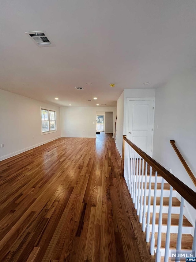 unfurnished room featuring hardwood / wood-style floors