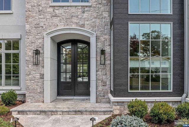 view of exterior entry with french doors