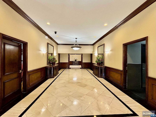 hallway featuring crown molding