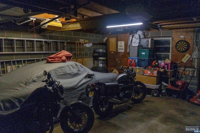 garage featuring a garage door opener