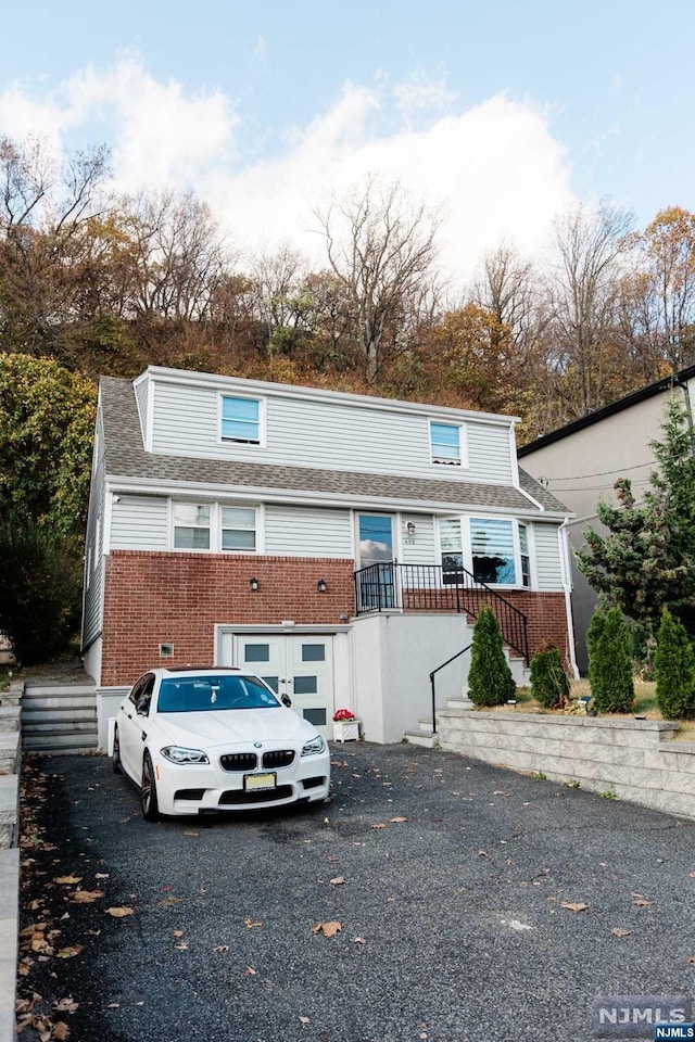 view of front of home with a garage