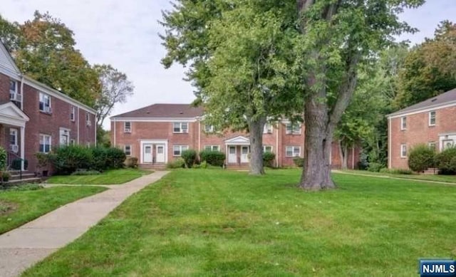 exterior space with a lawn