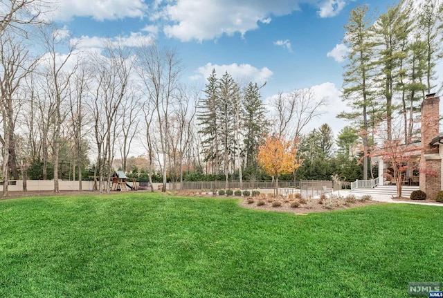 view of yard with a playground