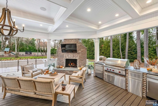 wooden deck featuring an outdoor living space with a fireplace, area for grilling, and grilling area