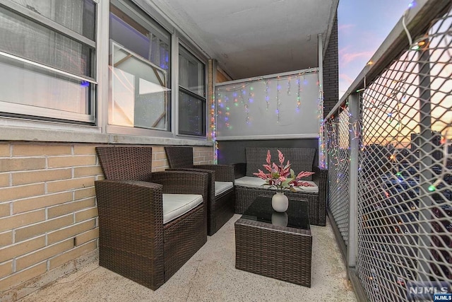 view of patio terrace at dusk