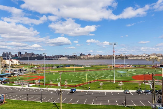 view of home's community with a water view