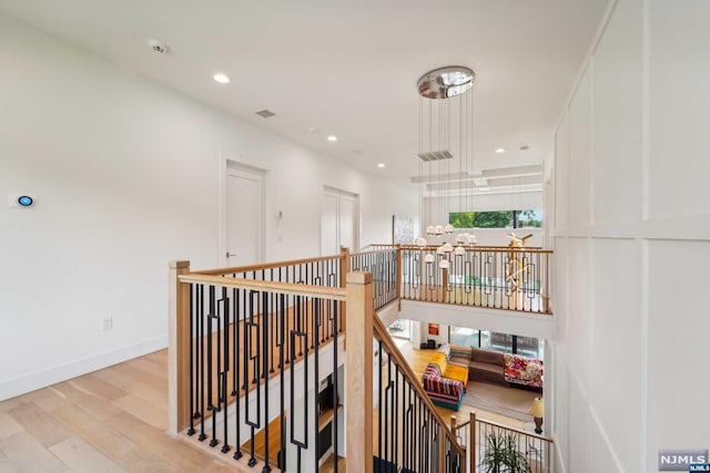 hall with light wood-type flooring