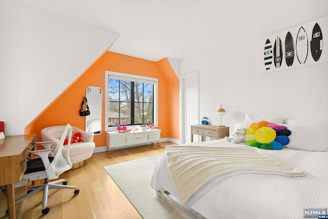 bedroom featuring hardwood / wood-style floors