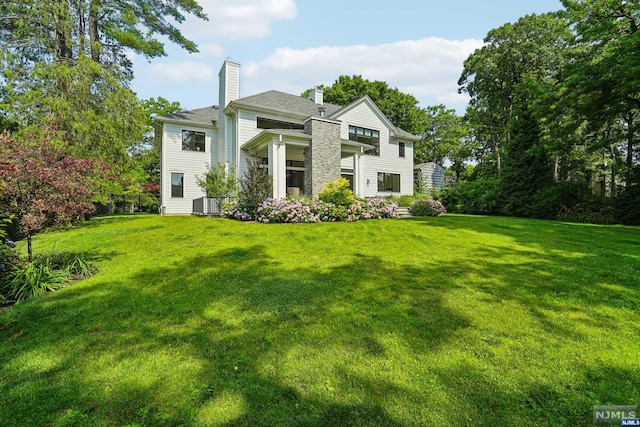 exterior space with a front lawn