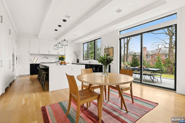 dining room featuring light hardwood / wood-style floors