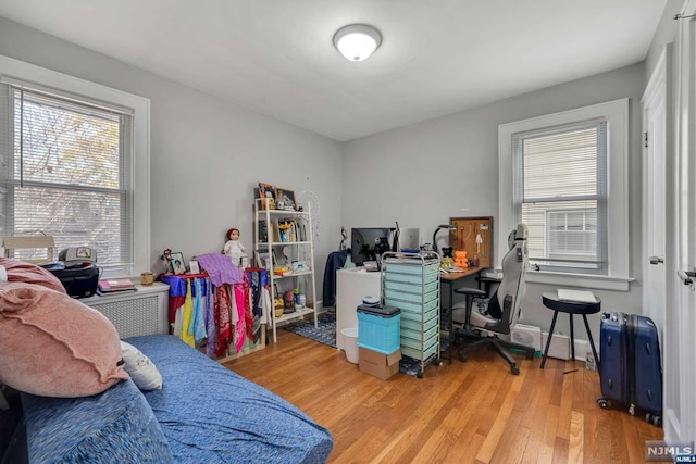 bedroom featuring light wood-type flooring