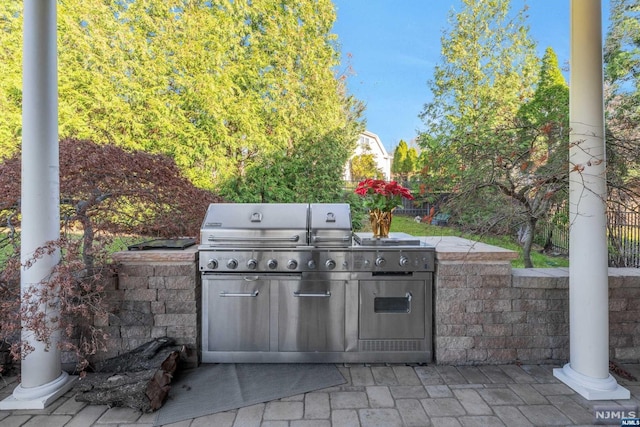 view of patio featuring a grill and area for grilling