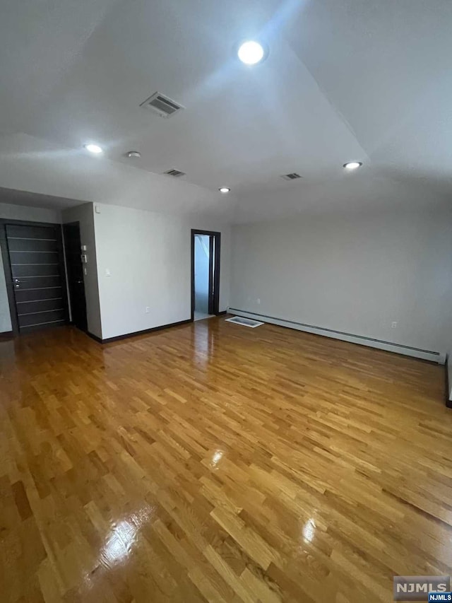 unfurnished room featuring light hardwood / wood-style flooring