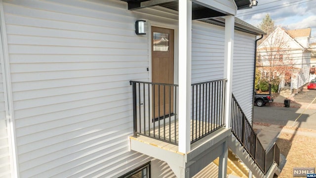 doorway to property with a balcony