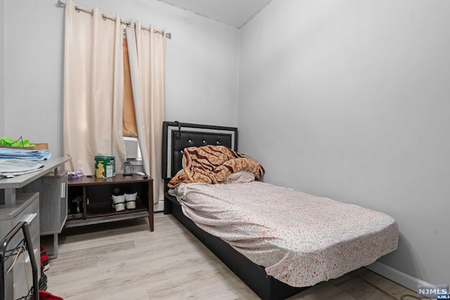 bedroom featuring light hardwood / wood-style flooring