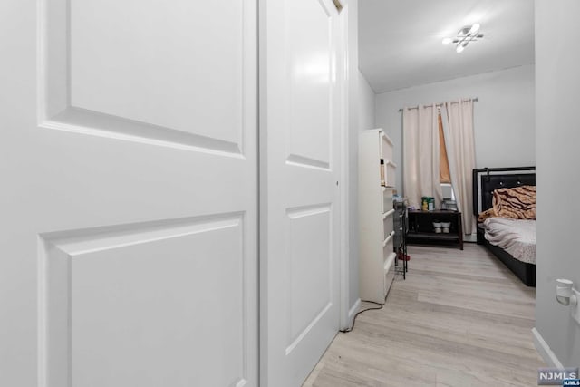 bedroom featuring light wood-type flooring