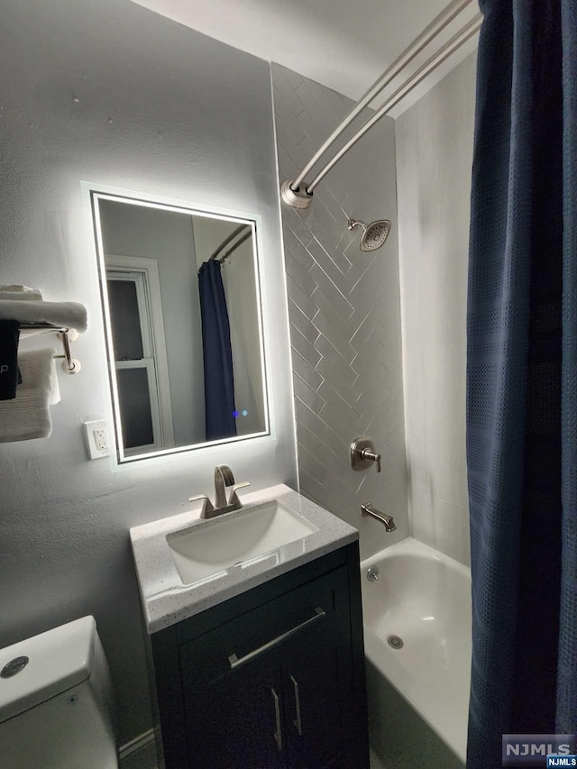 full bathroom with vanity, toilet, and shower / bathtub combination with curtain