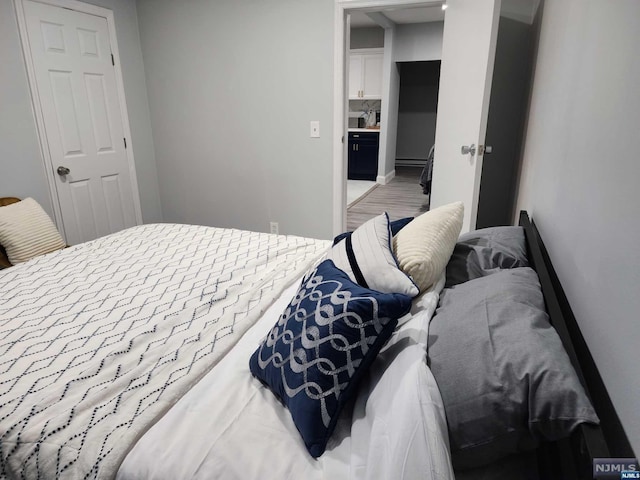 bedroom featuring light wood-type flooring