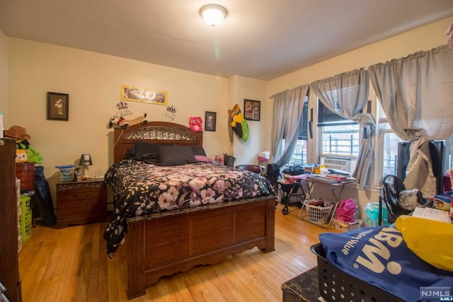 bedroom featuring light wood-type flooring