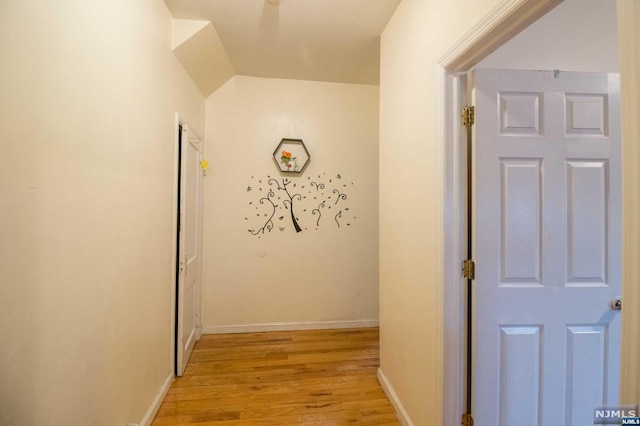 corridor featuring light hardwood / wood-style flooring