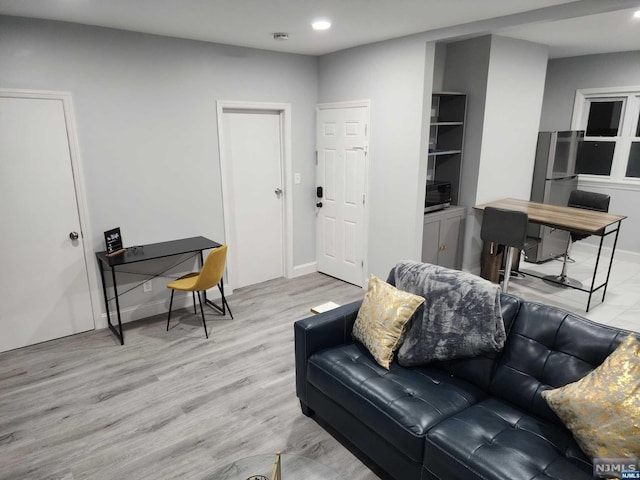 living room featuring light hardwood / wood-style floors