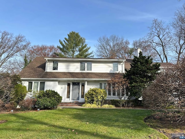 front of property featuring a front yard