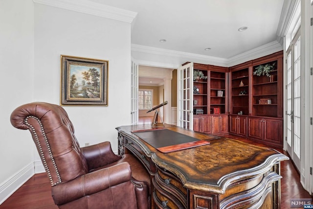 office area featuring french doors, dark hardwood / wood-style floors, and ornamental molding